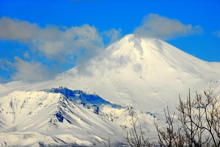 Kamchatka - Petropavlovsk-Kamchatsky - Pacific Ocean bay with ships and mountains with volcanoes.の写真素材