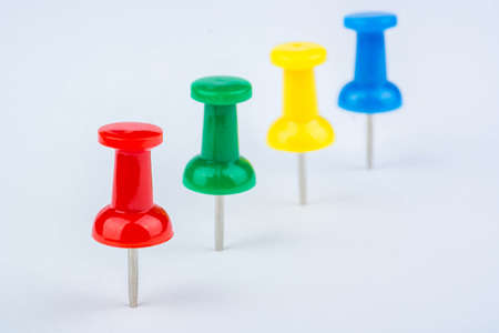 Four colored pushpin on white backgroundの写真素材