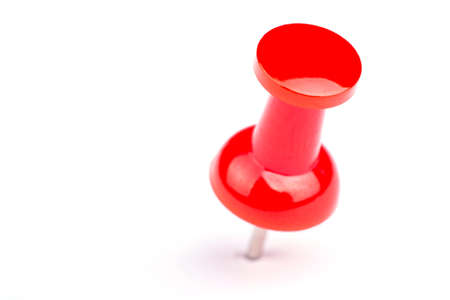 Red pushpin on a white backgroundの写真素材