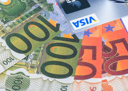 Euro banknotes of one hundred and fifty and a credit cardのeditorial素材