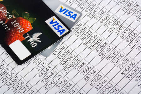 Financial report and two credit cardのeditorial素材