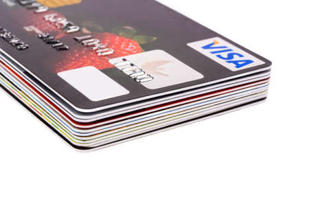 A large stack of credit cards on white tableのeditorial素材