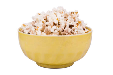 Full bowl of popcorn on a white backgroundの写真素材