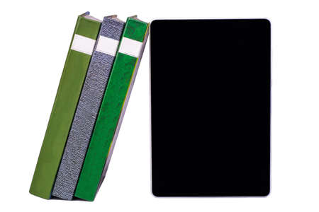 A stack of books with e-book stand on white backgroundの写真素材