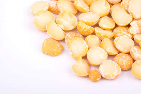 Scattered dry peas on a white backgroundの写真素材