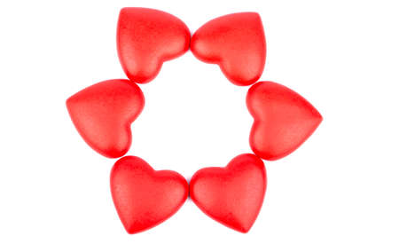 Sun built of red plastic hearts on a white backgroundの写真素材