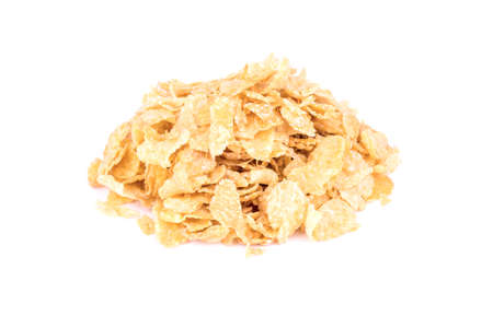 Heap of corn flakes on a white background