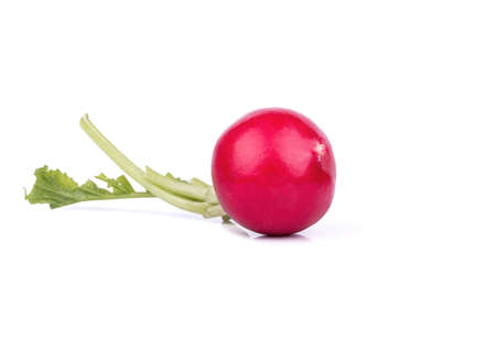 Single red radish with leaves on a white backgroundの写真素材