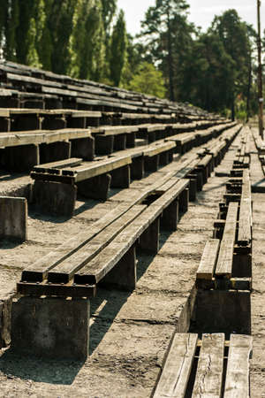 The old wooden destroyed the stands outdoorsの写真素材