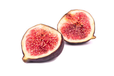 Two halves of fresh figs isolated on white backgroundの写真素材