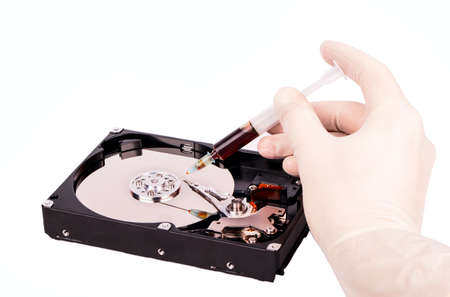 Treatment of the hard disk with (HDD) a syringe and injection