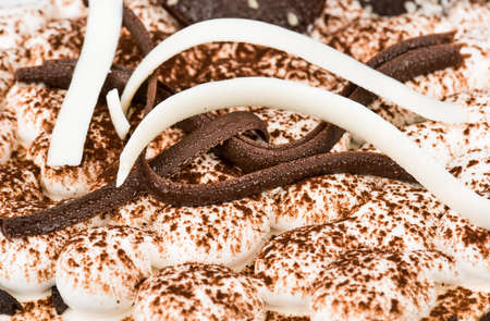 Decoration of white and dark chocolate for the cake