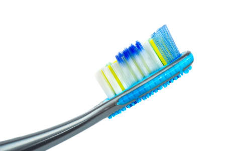 The head of a new toothbrush close-up on a white backgroundの写真素材