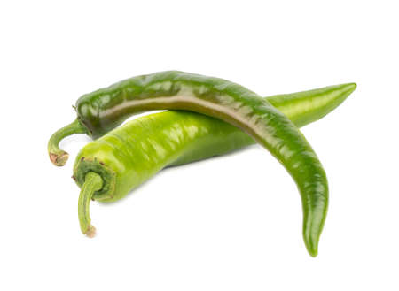 Two hot green pepper on a white backgroundの写真素材