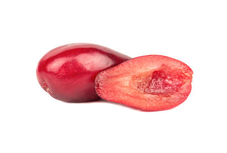 Juicy half of a cornel on a white background