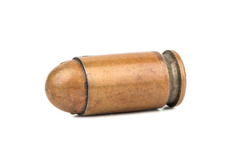 Old pistol bullet isolated on white backgroundの写真素材