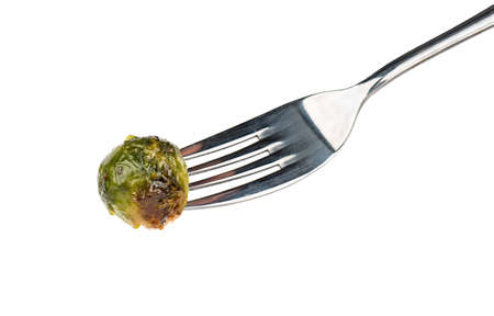 Fried brussels sprouts on fork isolated on a white backgroundの写真素材