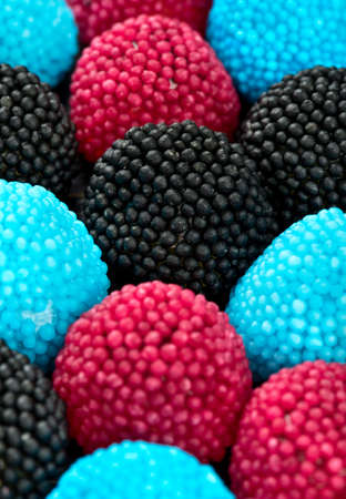 Delicious berry colored jelly sweets close upの写真素材