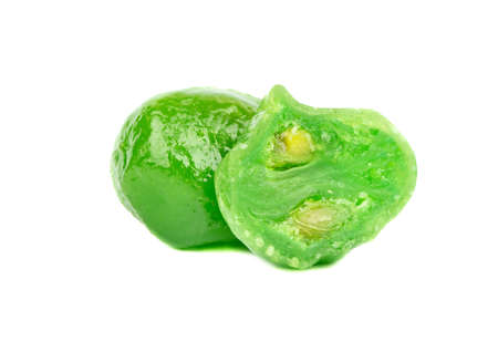 Dried green kumquat and half on a white backgroundの写真素材