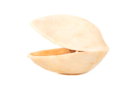 Empty shell of pistachio nuts on a white background