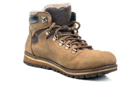Old and dirty mens winter boots isolated on white backgroundの写真素材