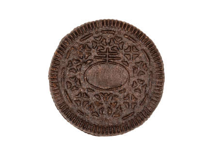 Black cookies with cream isolated on white background, top viewの写真素材