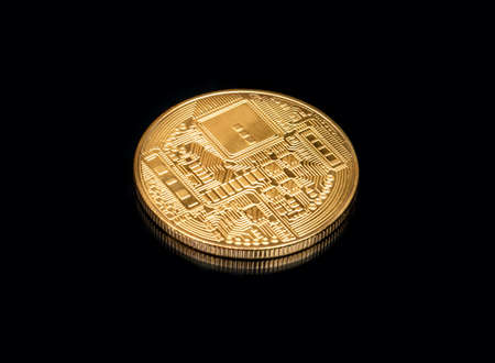 Back side of the Golden coin bitcoin on black background
