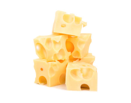 Several cubes of cheese with holes on a white backgroundの写真素材