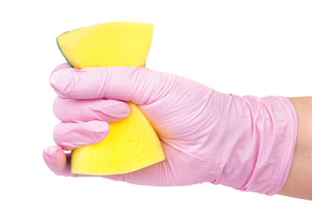 Hand in glove holding yellow dish washing sponge on white background