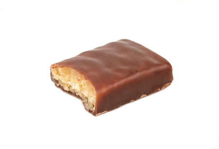 Bitten chocolate candy isolated on white background
