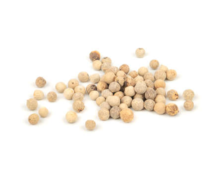 Several white pepper peas on a light backgroundの写真素材