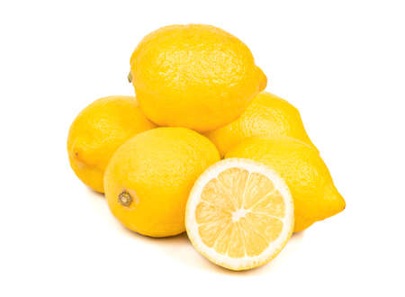 Bunch of lemons with a juicy half on a white backgroundの写真素材