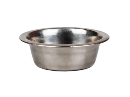 Iron empty animal feed bowl isolated on white backgroundの写真素材