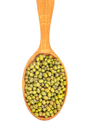 Large spoon with the dry mash beans isolated on white backgroundの写真素材