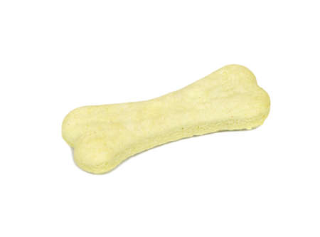 Dog biscuits in bone shape isolated on white backgroundの写真素材