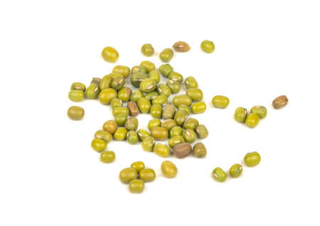 Scattered green mung beans on white backgroundの写真素材