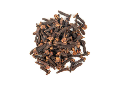 Pile of dry cloves on white background, top viewの写真素材