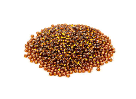 Bunch of brown beads on a white backgroundの写真素材