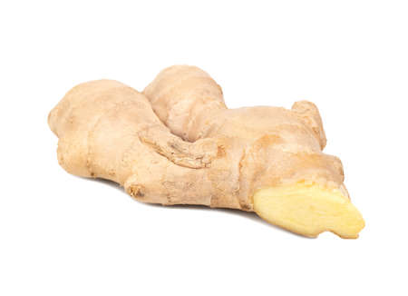 Piece of fresh ginger root isolated on white backgroundの写真素材