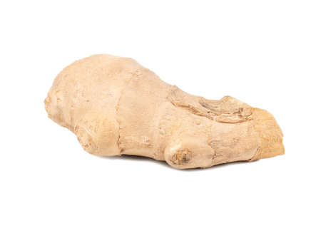 Piece of fresh ginger root isolated on white backgroundの写真素材