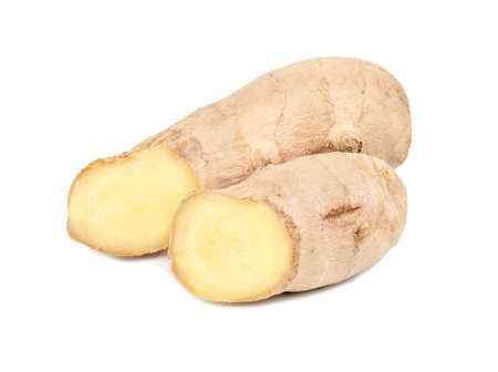 Two small ginger roots on white backgroundの写真素材
