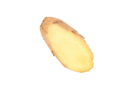 Slice of fresh ginger root isolated on white backgroundの写真素材