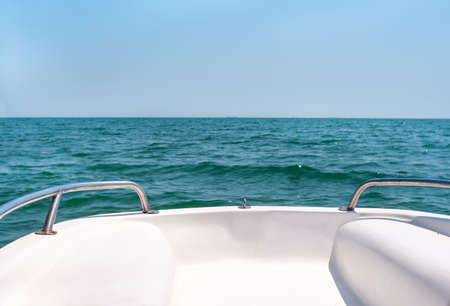 View of the waves of the black sea from the deck of the boat on a summer dayの写真素材