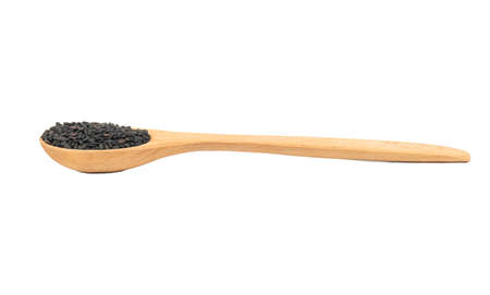 Small spoon with black sesame isolated on white backgroundの写真素材