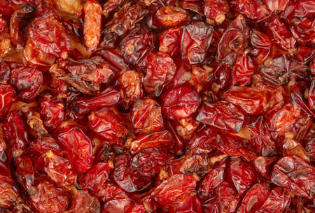 Background from scattered dry red barberry close upの写真素材