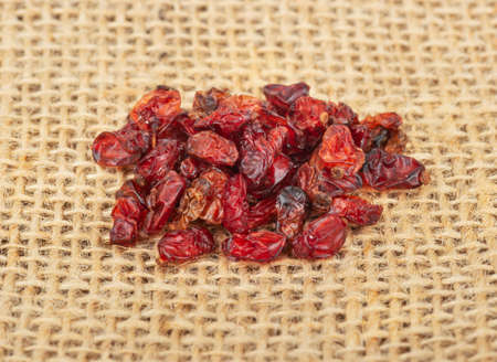 Small pile of dry barberry on the burlap close-upの写真素材