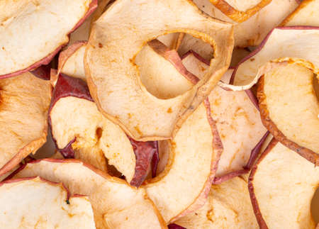 Background of scattered dry Apple chips close upの写真素材