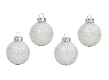 Four silver Christmas ball on white backgroundの写真素材