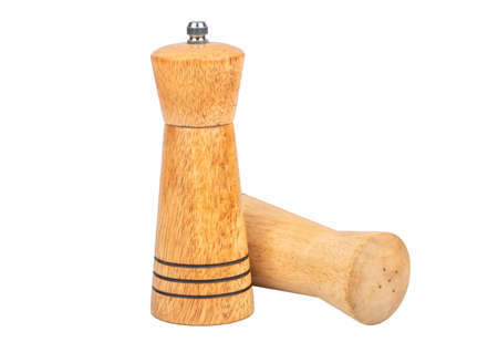 Wooden salt shaker and pepper shaker isolated on white backgroundの写真素材