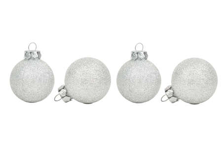 Four silver Christmas ball on white backgroundの写真素材